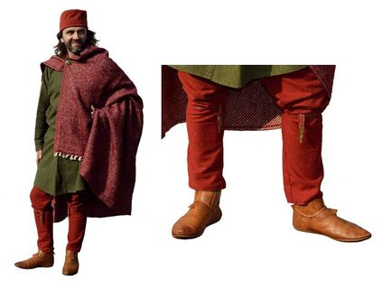 Frisian AD793‑899 He wears distinctive Frisian fashion, a 'pill box' hat, buckled leather garter straps and a 'pallia fresonica' or Frisian cloak.
