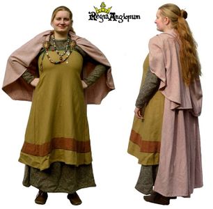 Viking Bondi AD793‑979 She wears a full oval brooch set, hangerock, shawl and back train.